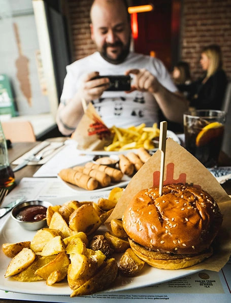 Chef preparing burger