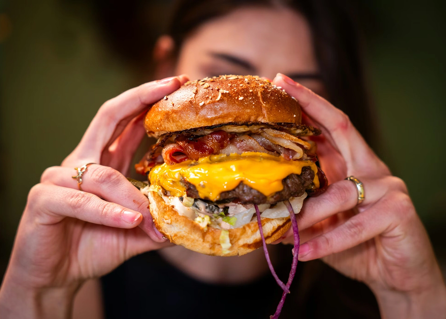 Cheesy burger with dripping cheese